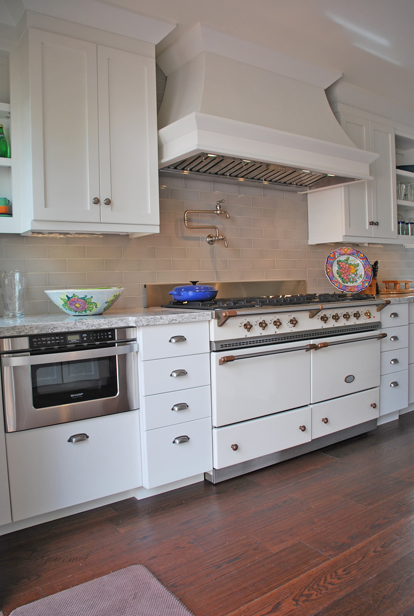 kitchen design with oven and custom hood